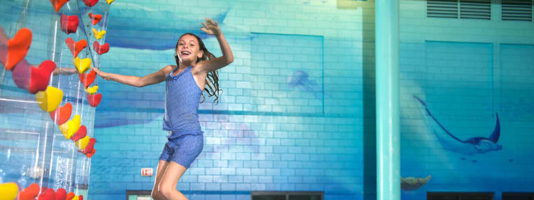 pool rock climbing wall